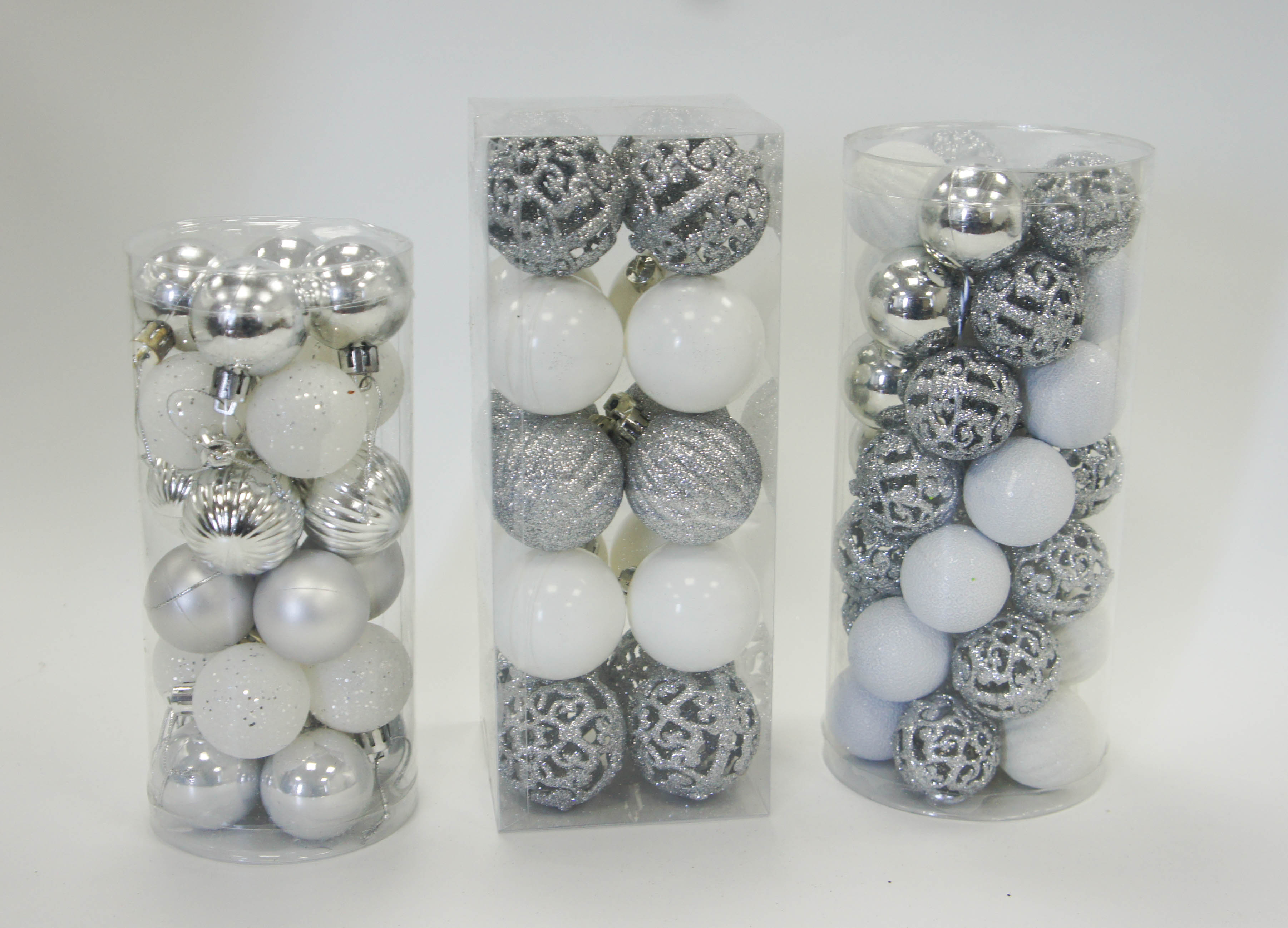 Silver and white hollowed-out Christmas balls