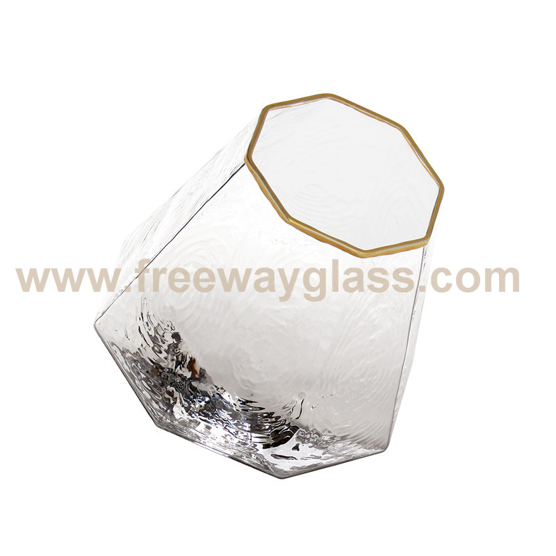 Multi prism glass cup with gold rim