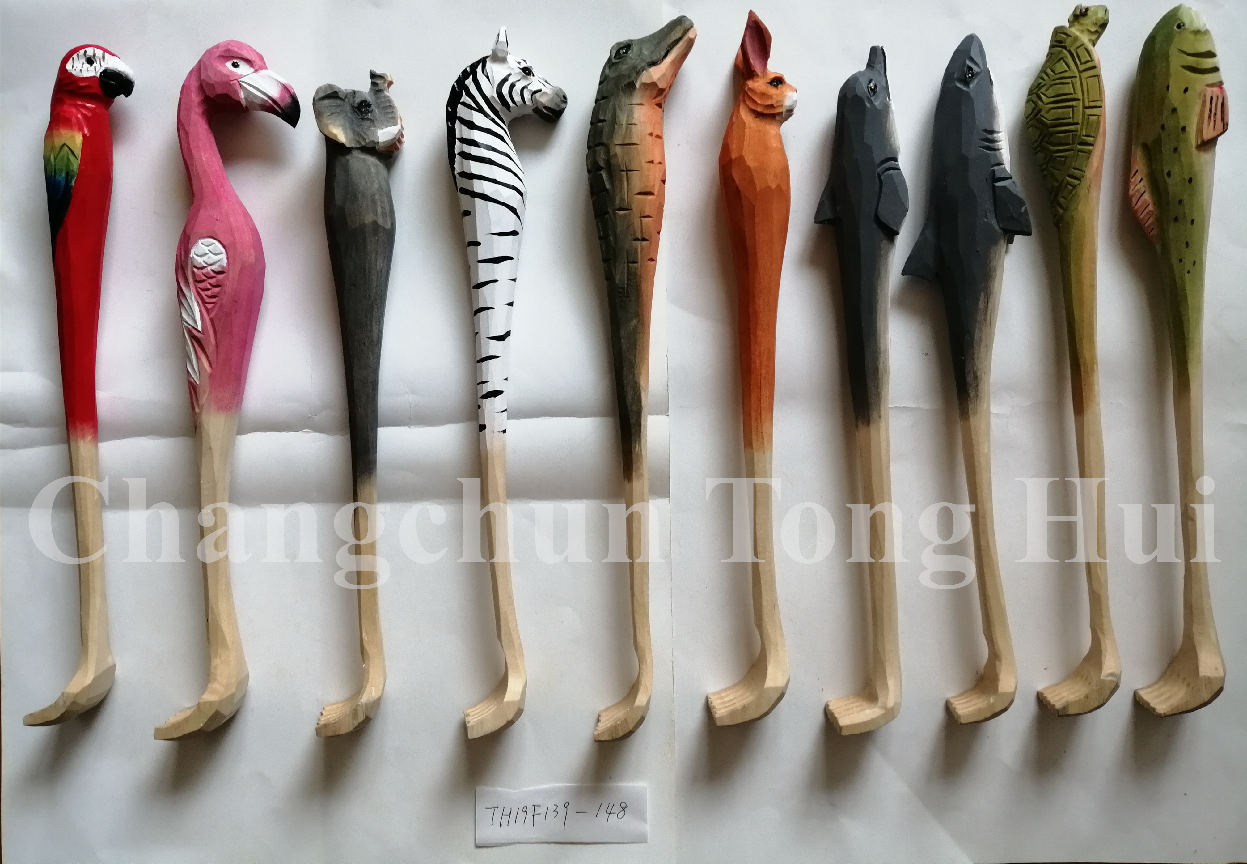 Wood carved animal backscratcher