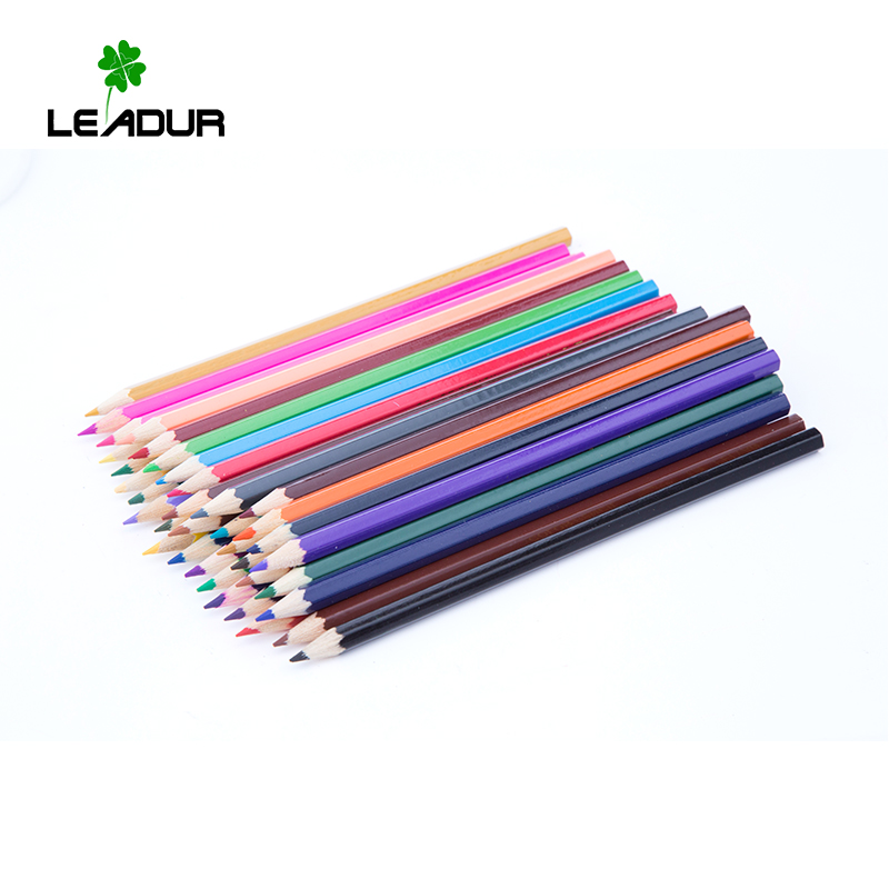 Student hand drawing colorful pencils