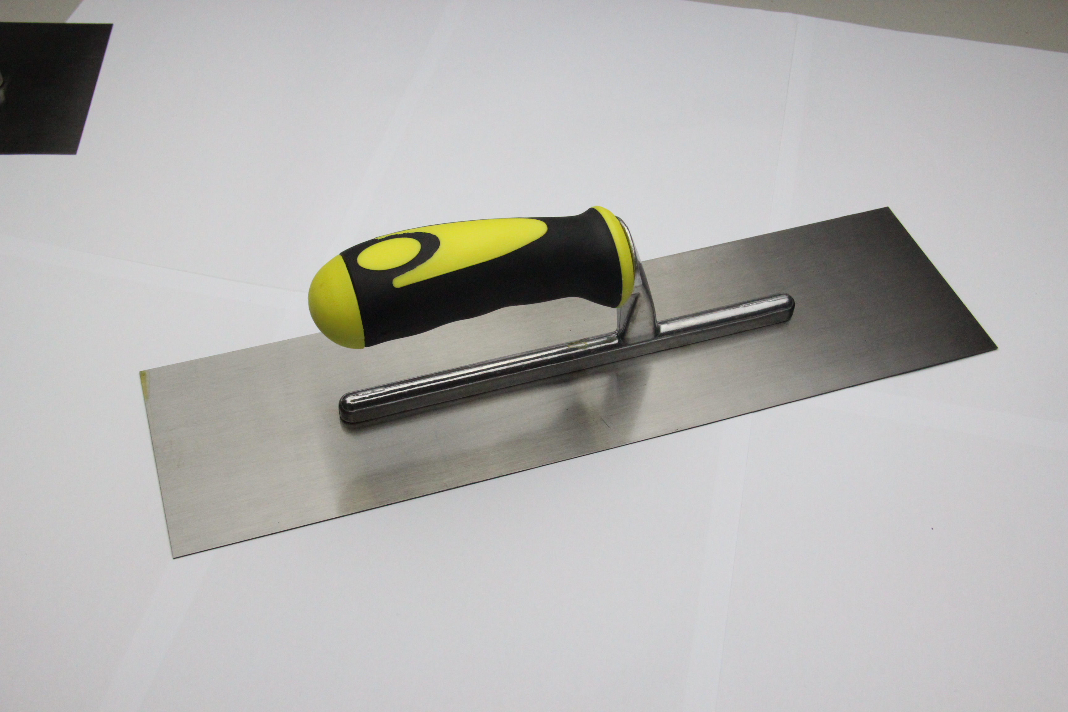 American Trowel In Carbon Steel,curved Blade, Rubber Handle