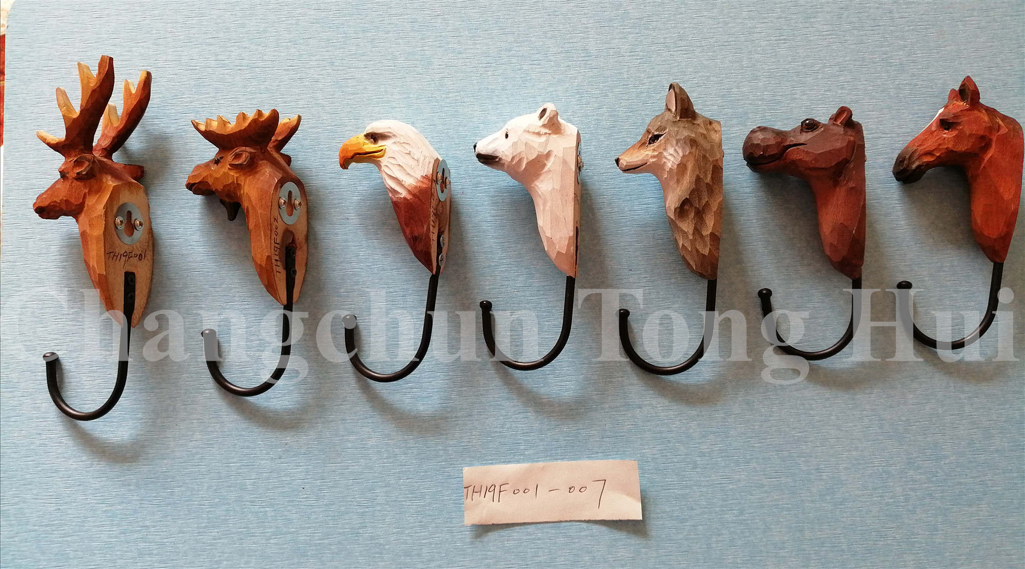 wood carved animal head hook