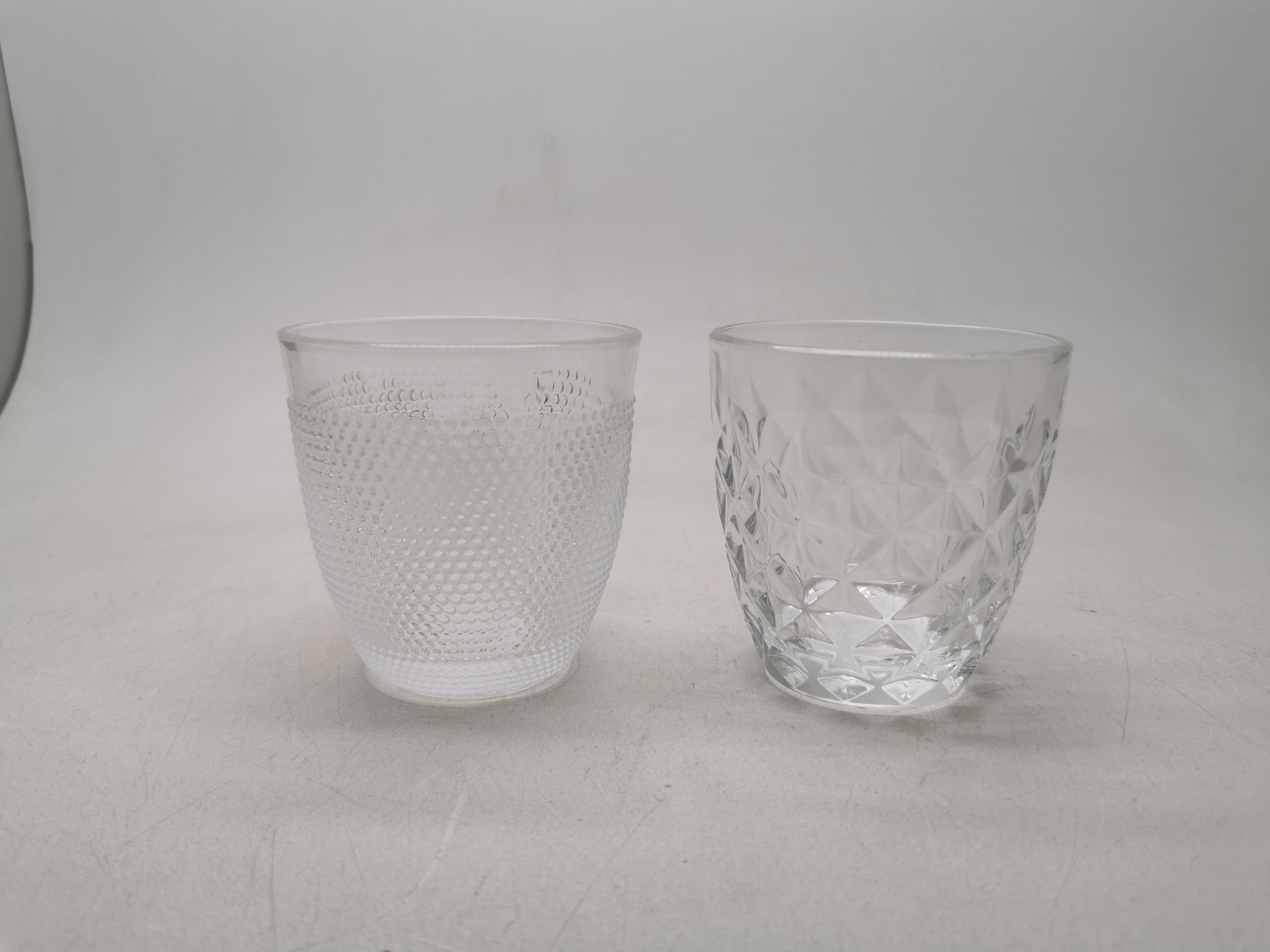 Transparent glass tumbler