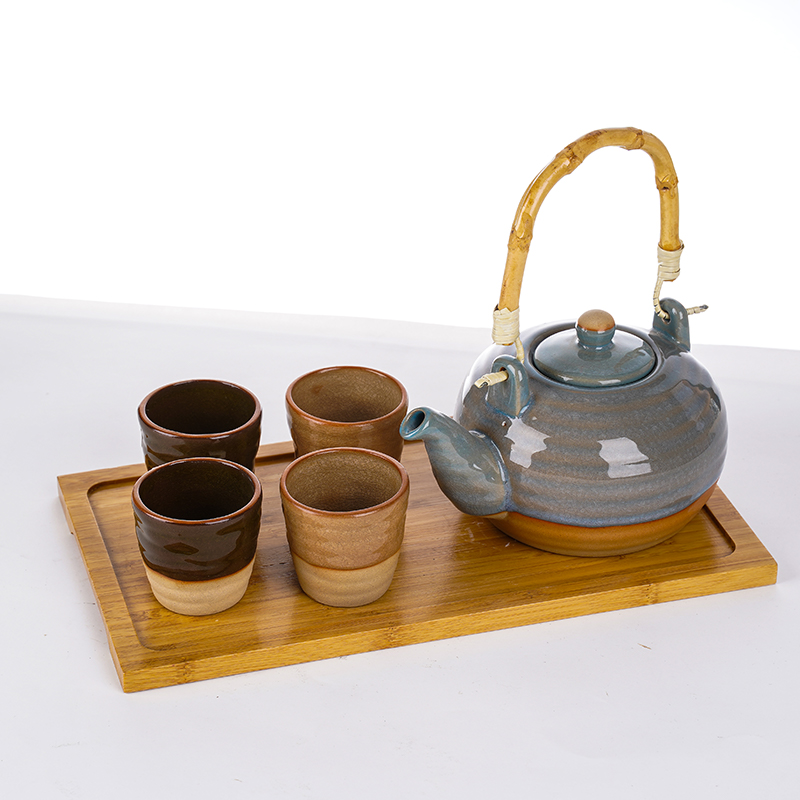Teapot with 4 cups with bamboo tray