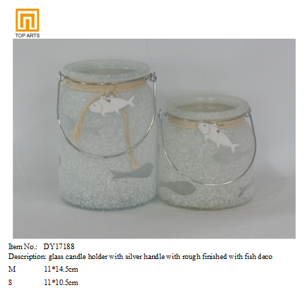 glass candle holder with silver handle with rough finished with fish deco