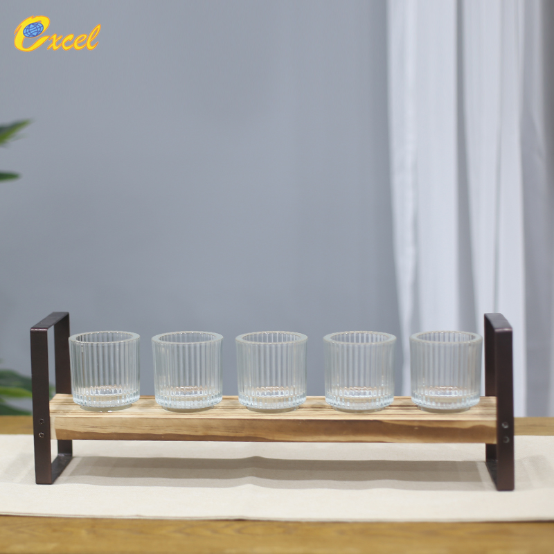 glass candle holder with wood and metal base