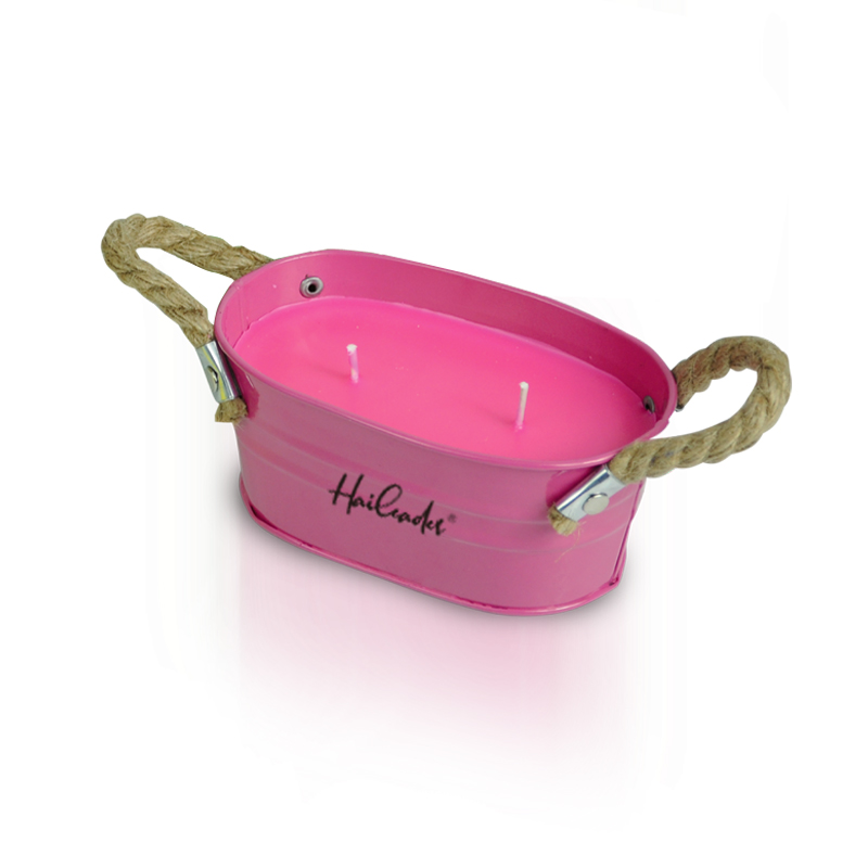 Citronella candles in metal bucket