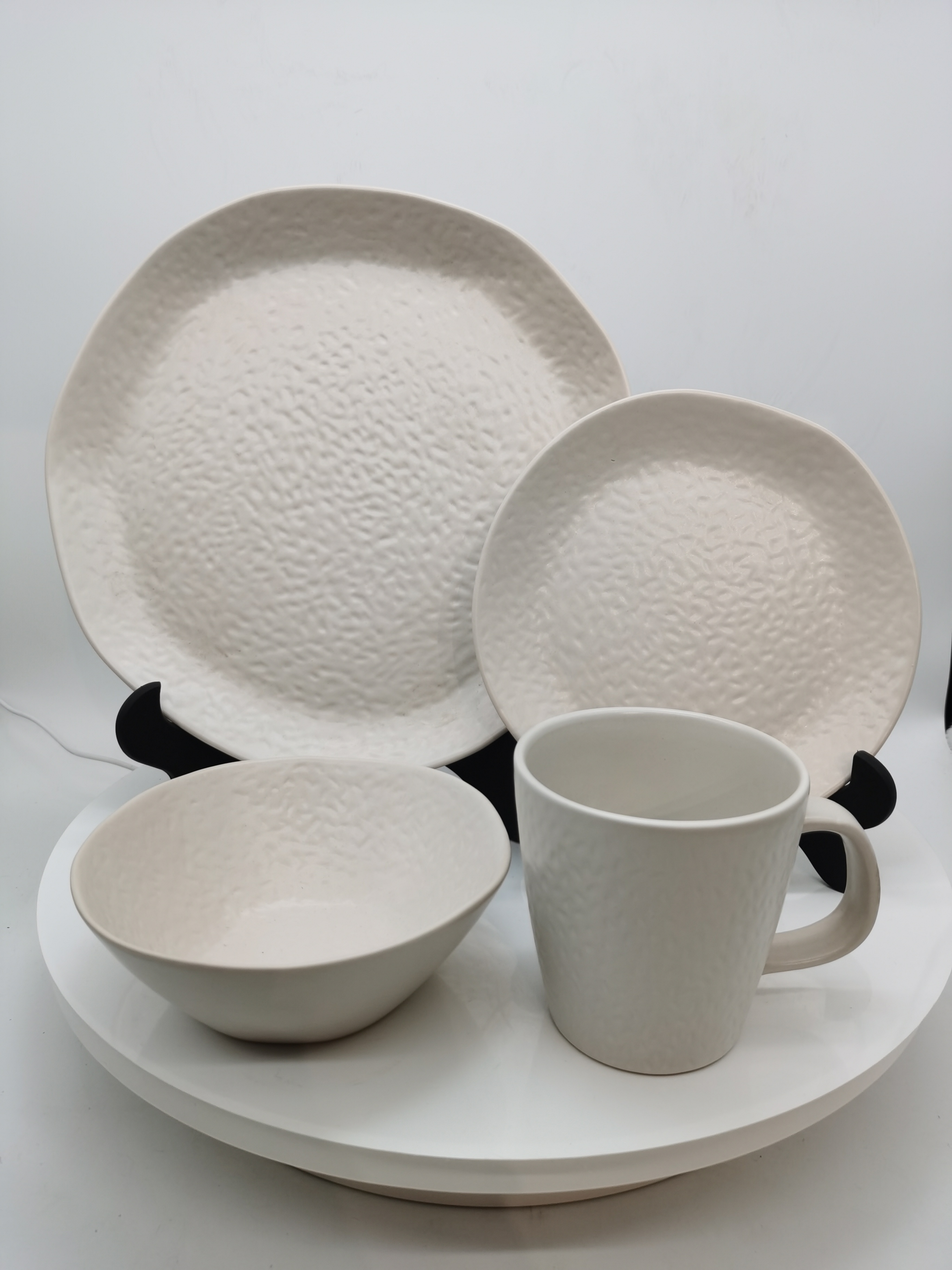 White embossed irregular dinnerware set