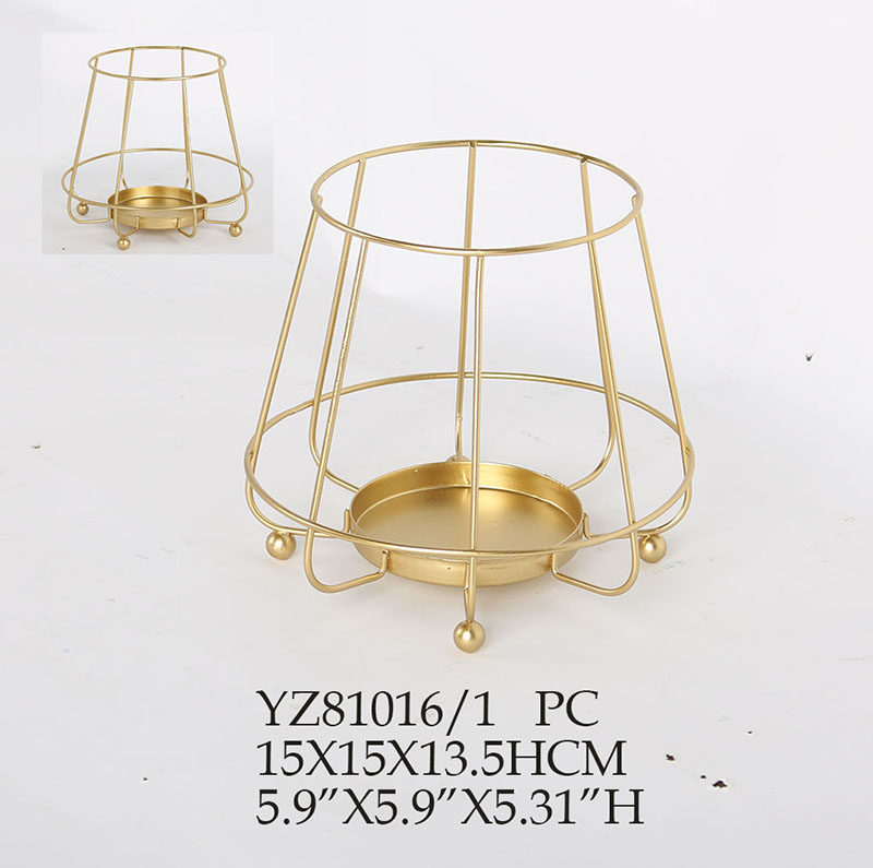 golden metal candle holder