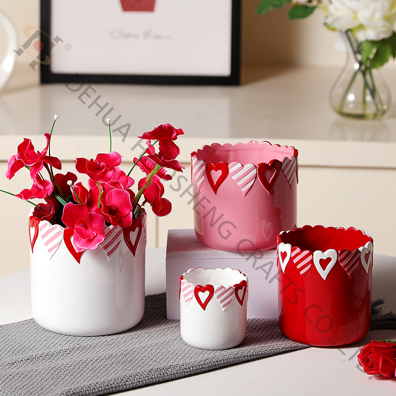 Ceramic flower pot with heart emboss pattern