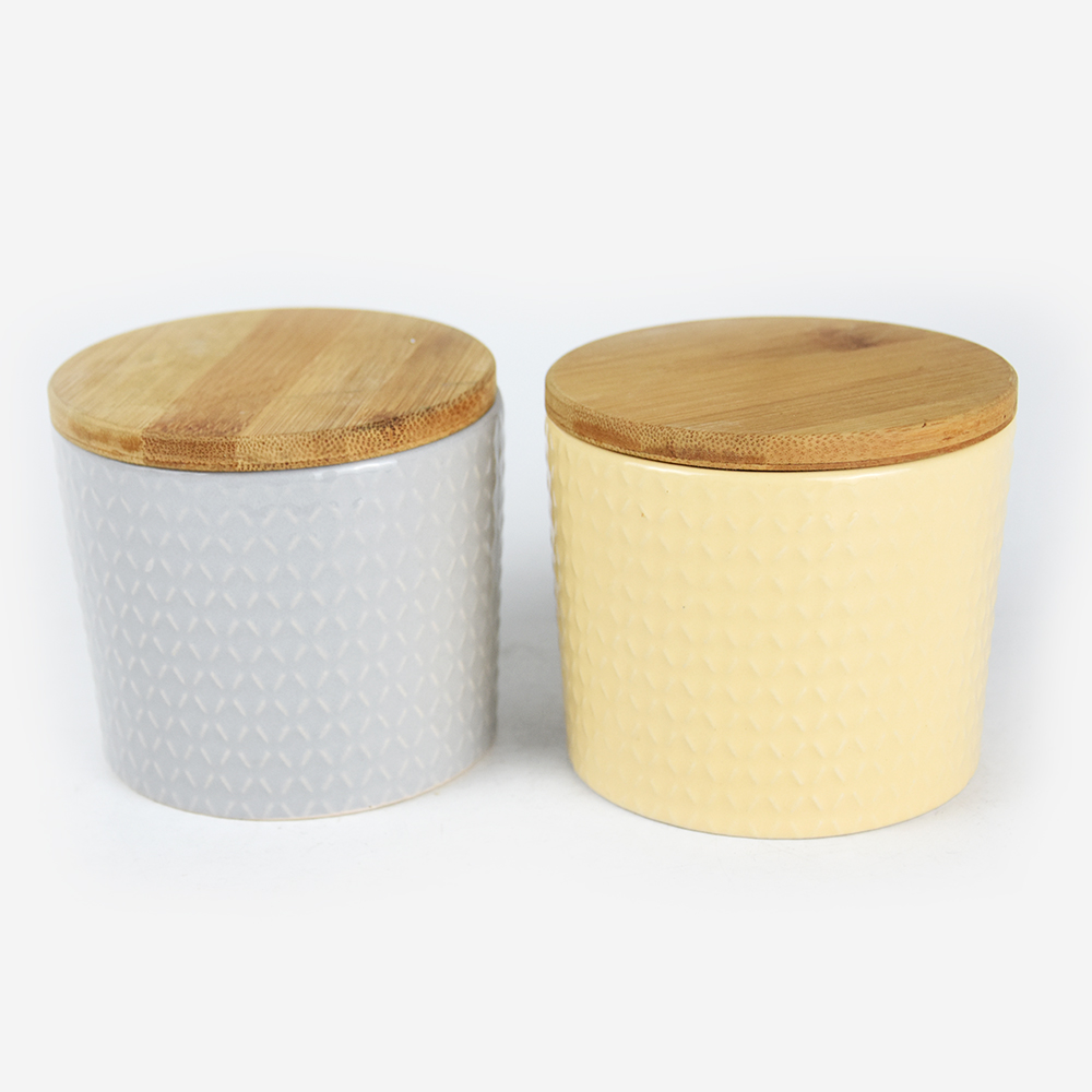 4‘’ ceramic glaze canister with bamboo lid & embossment
