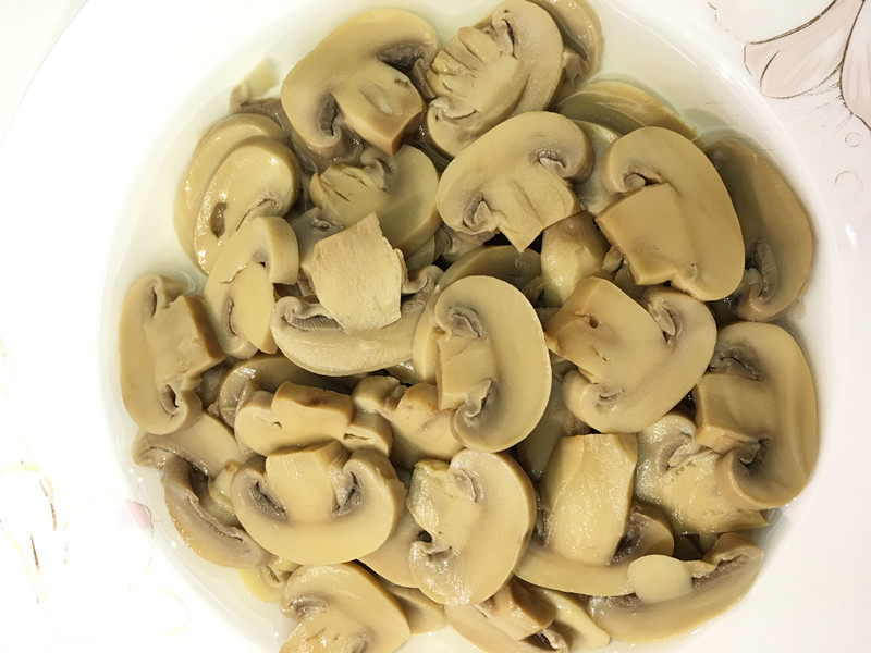 Canned mushroom slices in brine