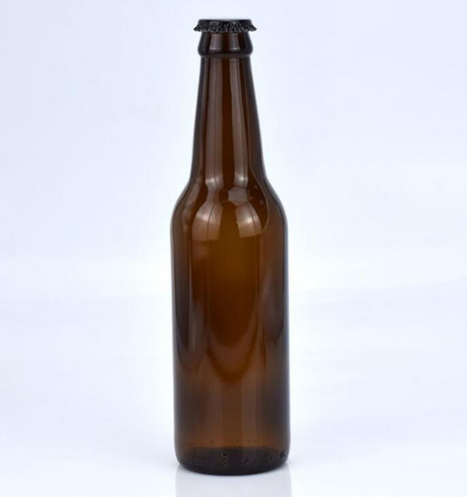 China cheap price wholesale 550ml clear wine glass beer bottles with metal cap