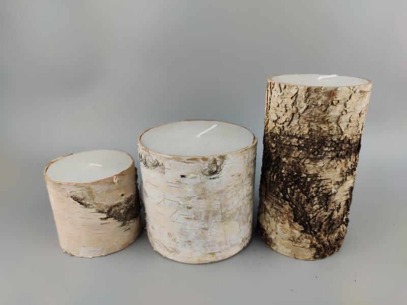 pillar candle wrapped with birch bark