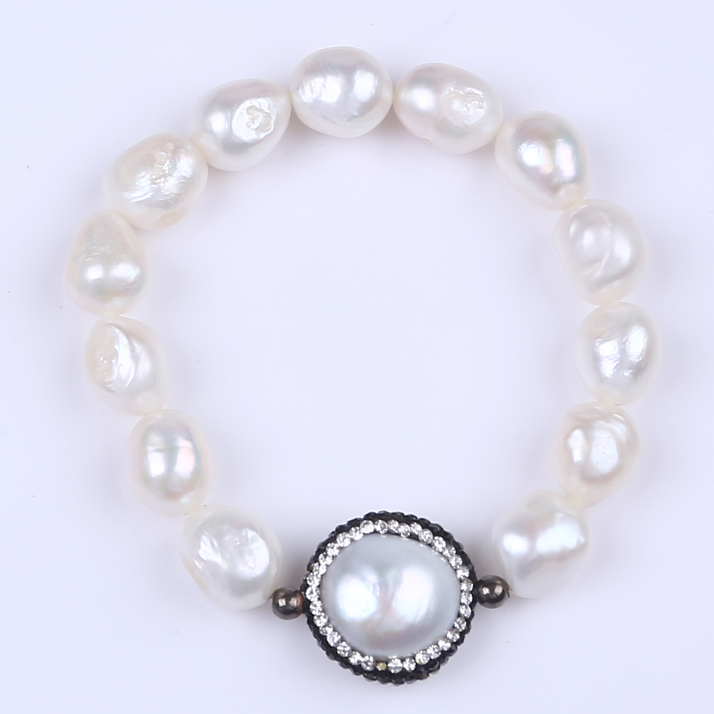 New design encased pearl with baroque pearl bracelet