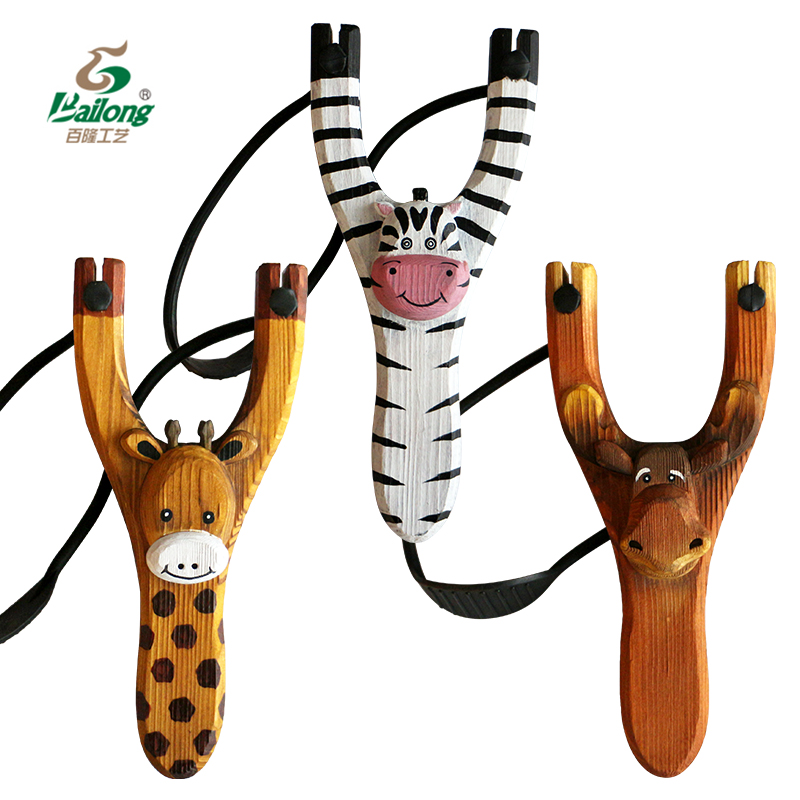 Wooden carvings of cartoon animal slingshots