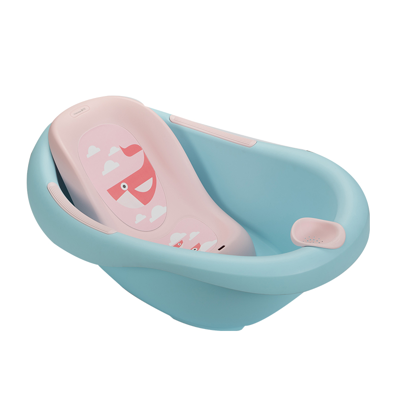 Plastic seat and soak baby bath tub with non-slip grip and small baskets for toys and soap