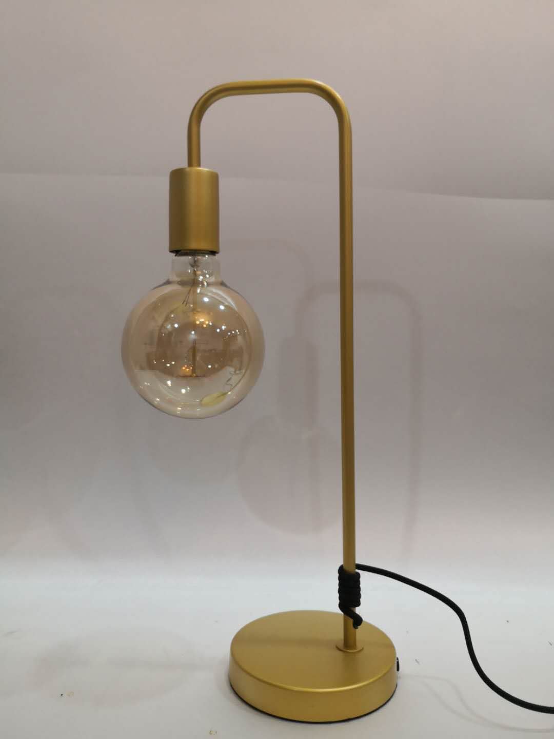 Bent table lamp