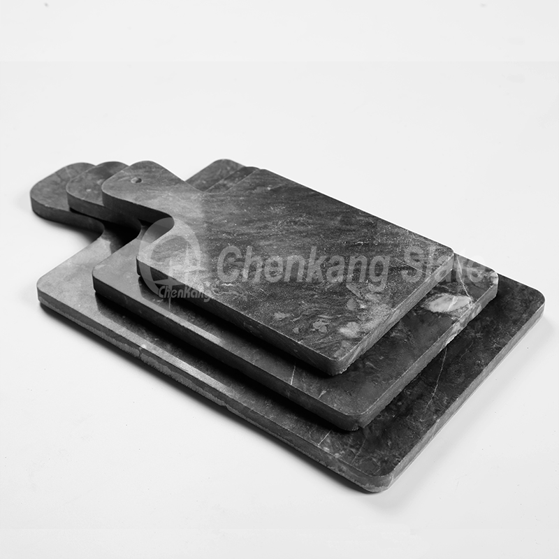 Black marble cheese board paddle shape