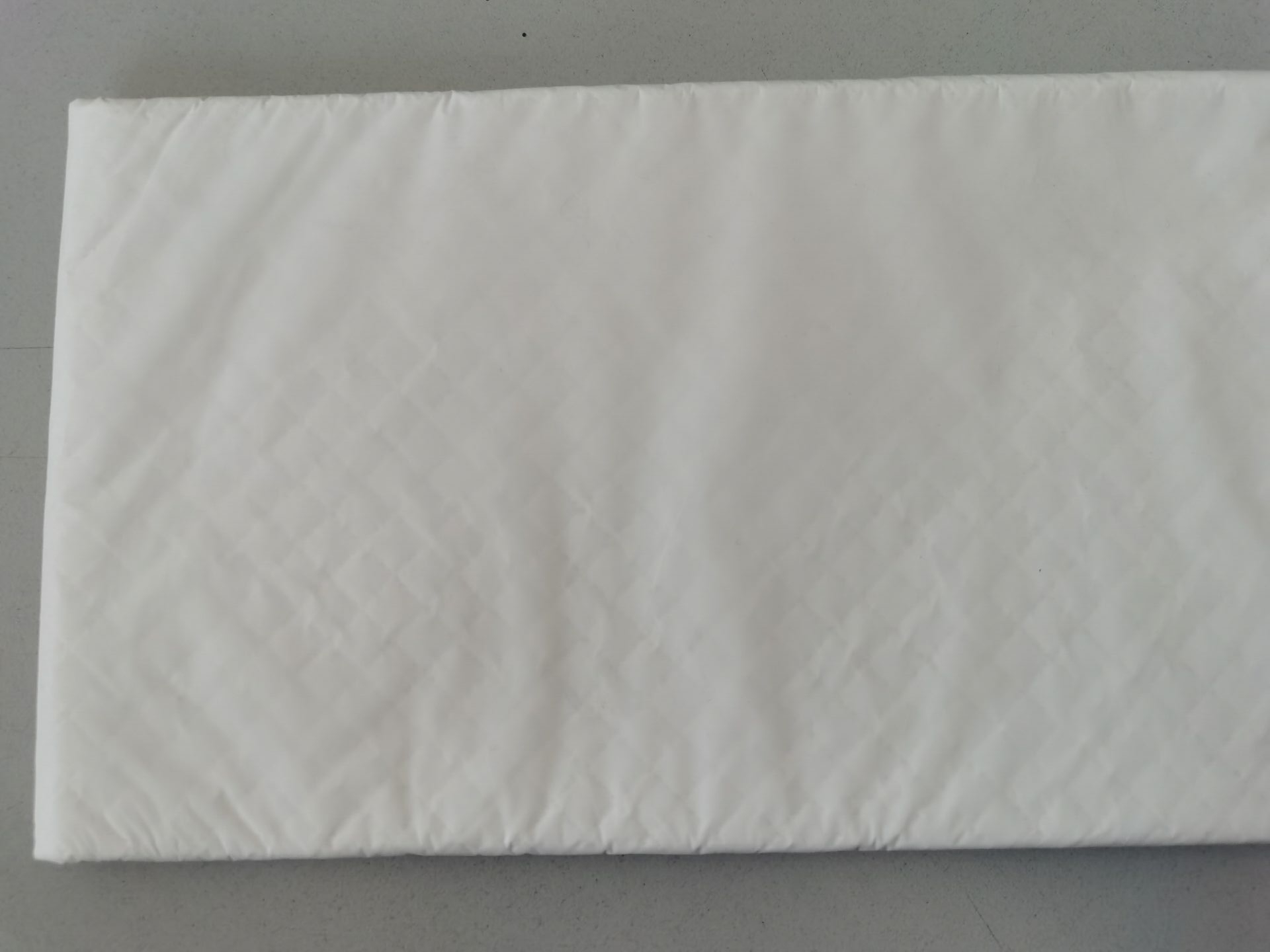 Pet pad with white PE film