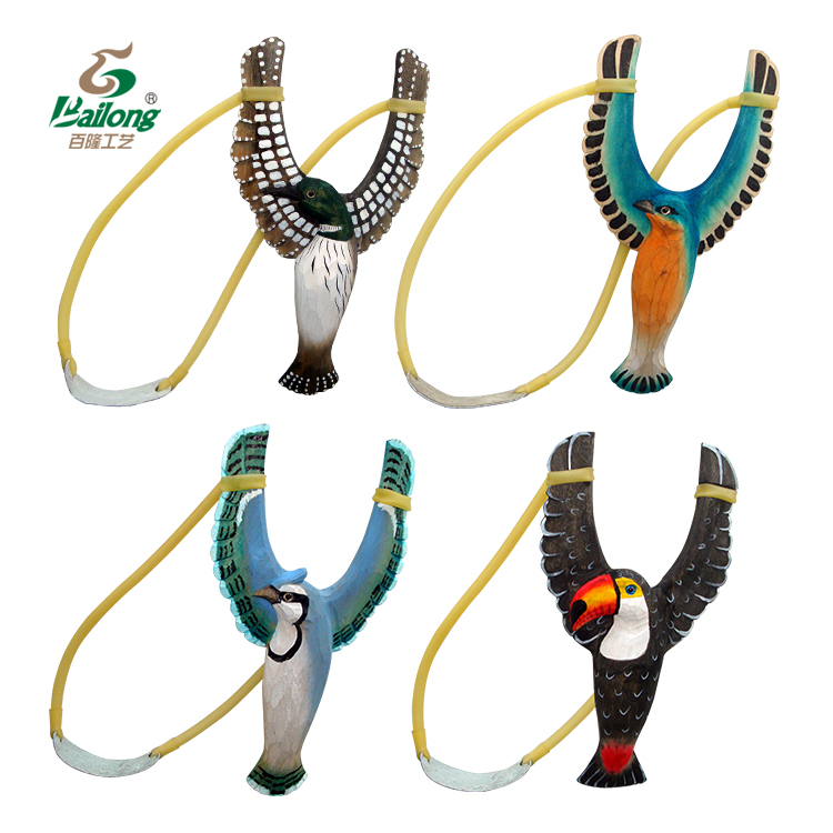 Hand carved wooden winged animal slingshot