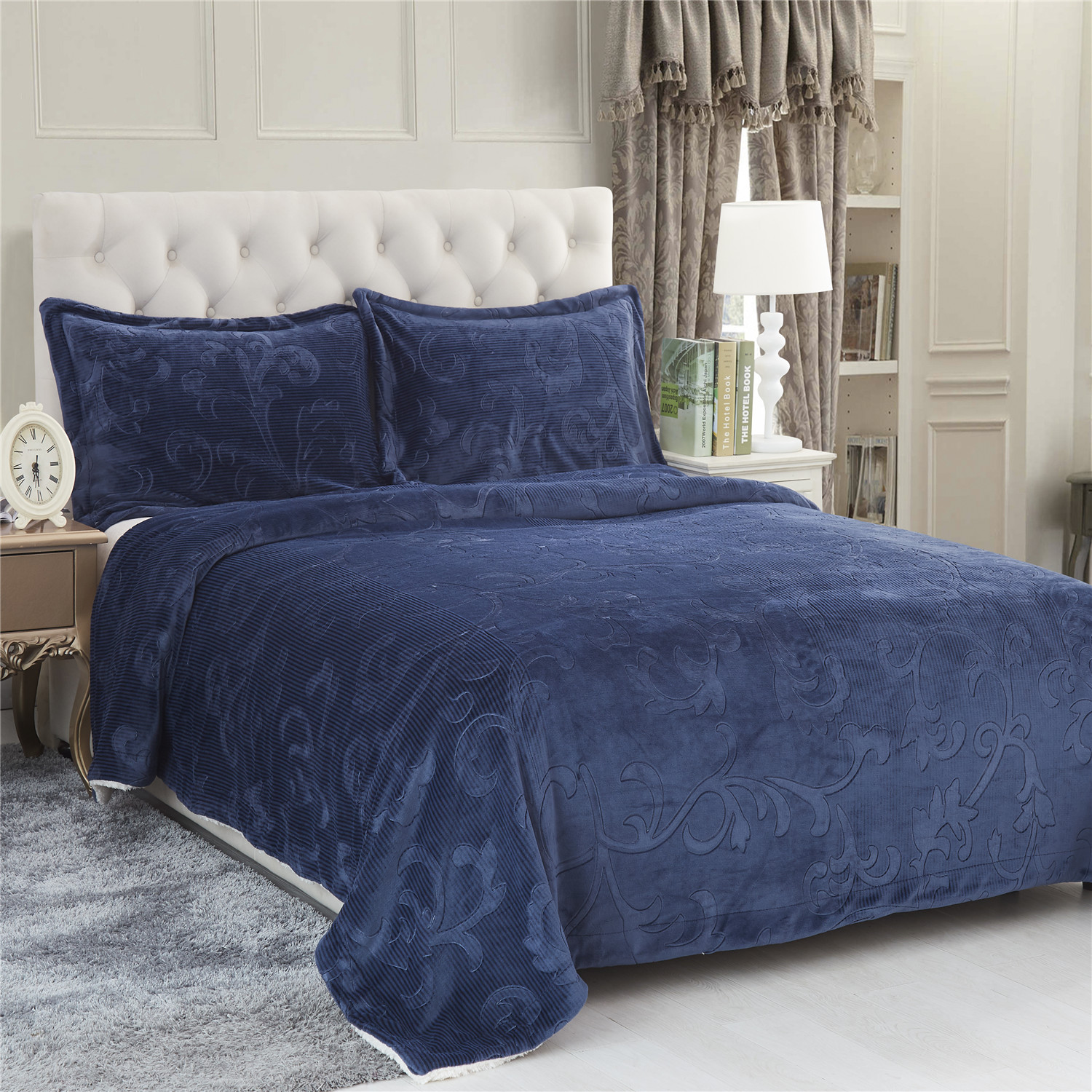 Soild color embossed flannel double layer blanket