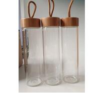 glass water bottle with bamboo lid