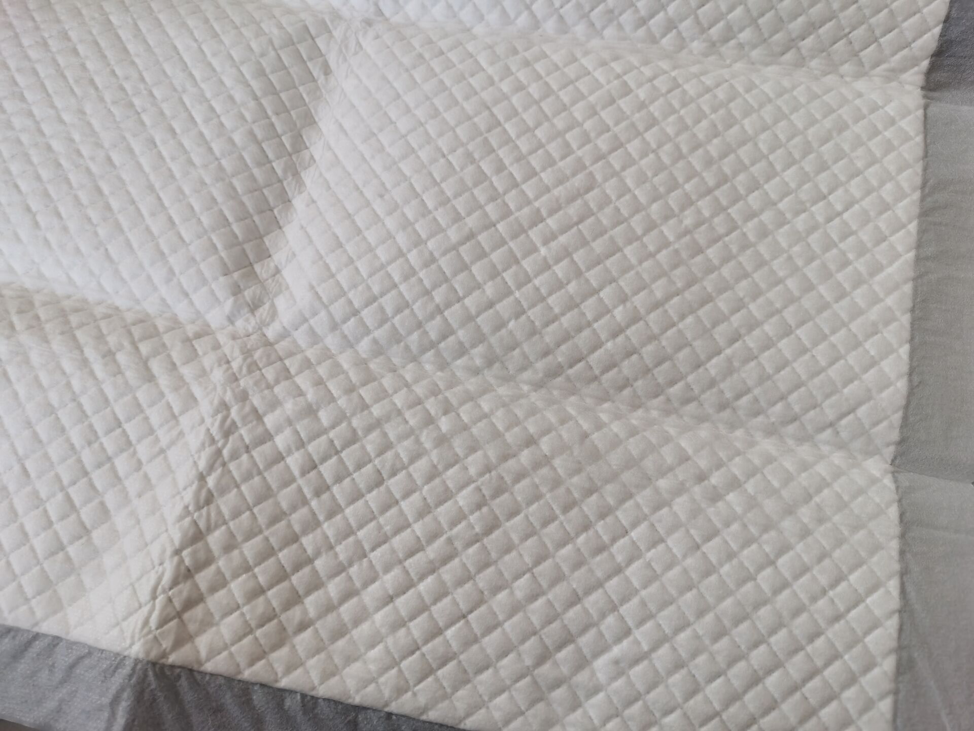 Diamond embossed pet pad