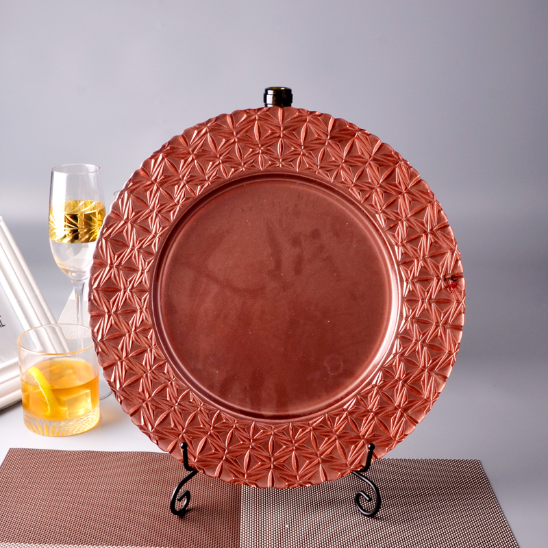 Orange-red diamond-lined glass charger plates, table items
