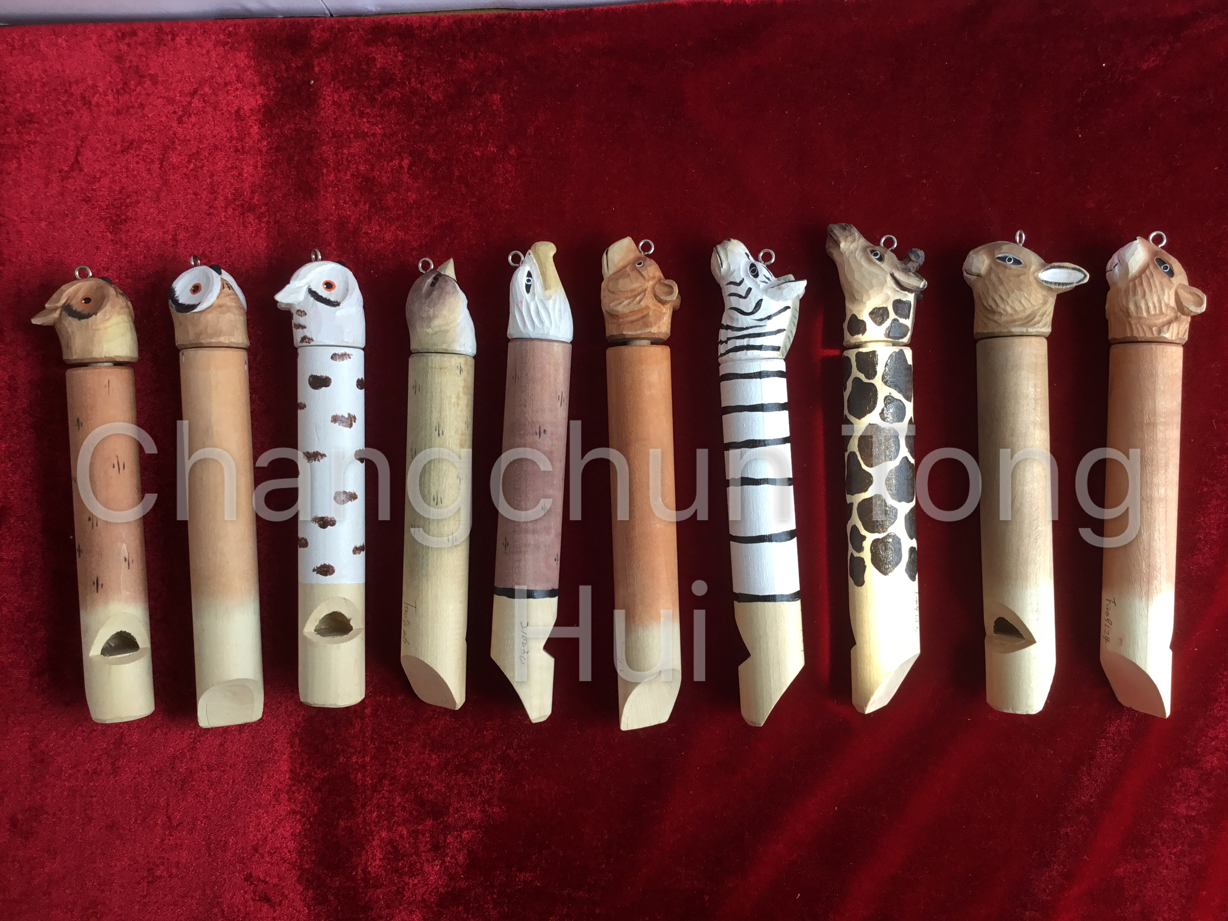 Wood carved sliding whistle