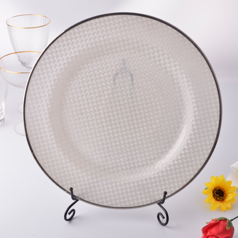 Woven glass fruit charger plate with silver rim, household cutlery