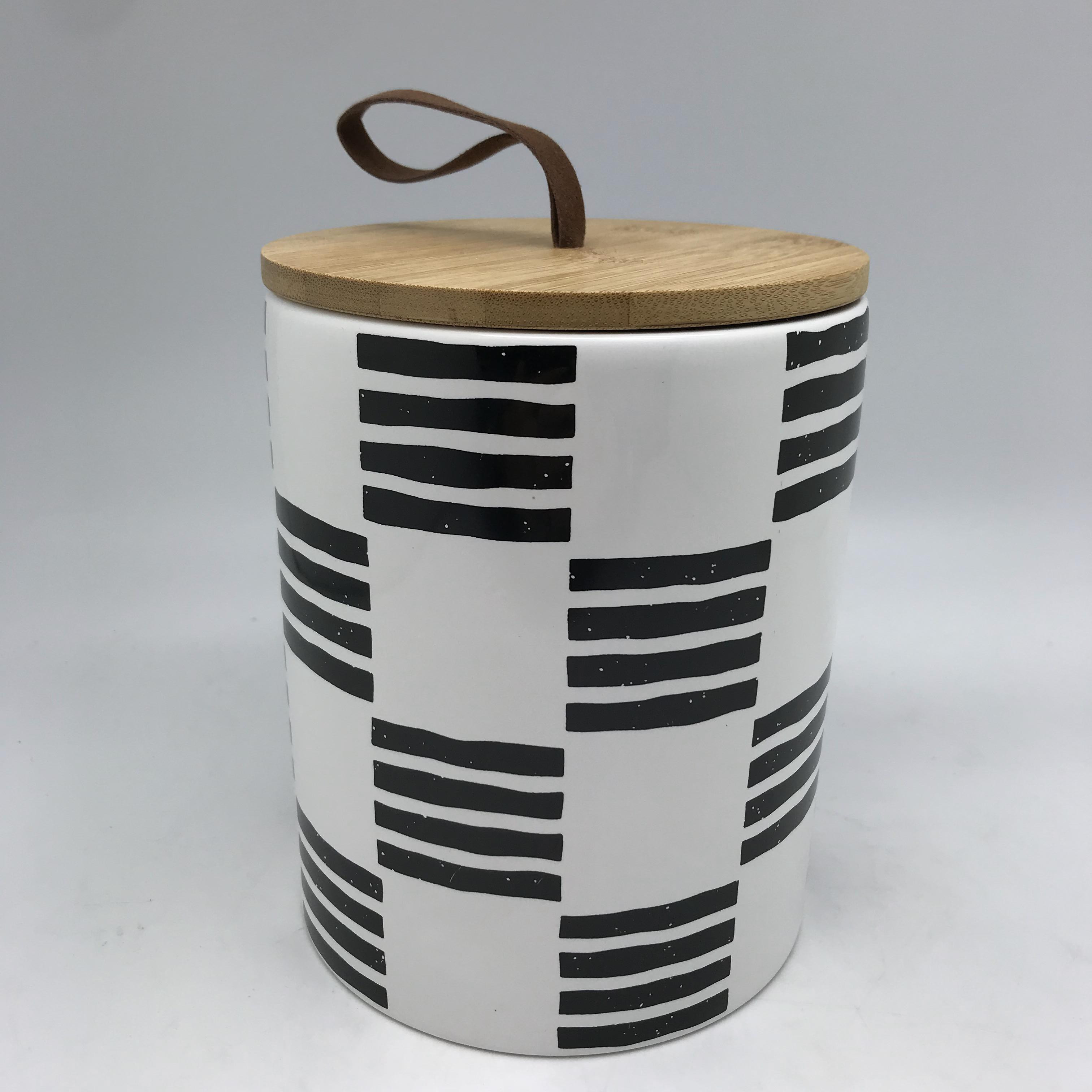 Ceramic canister with wooden cover moistureproof