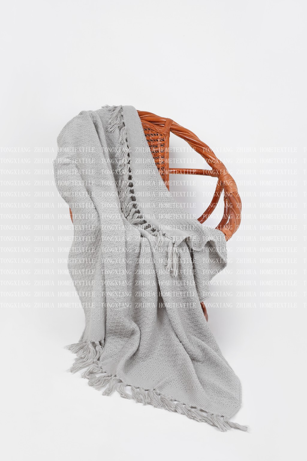 Tassel knitting throw