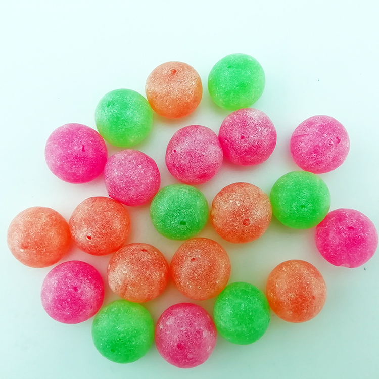 Ball shape sour coated hard boiled candy