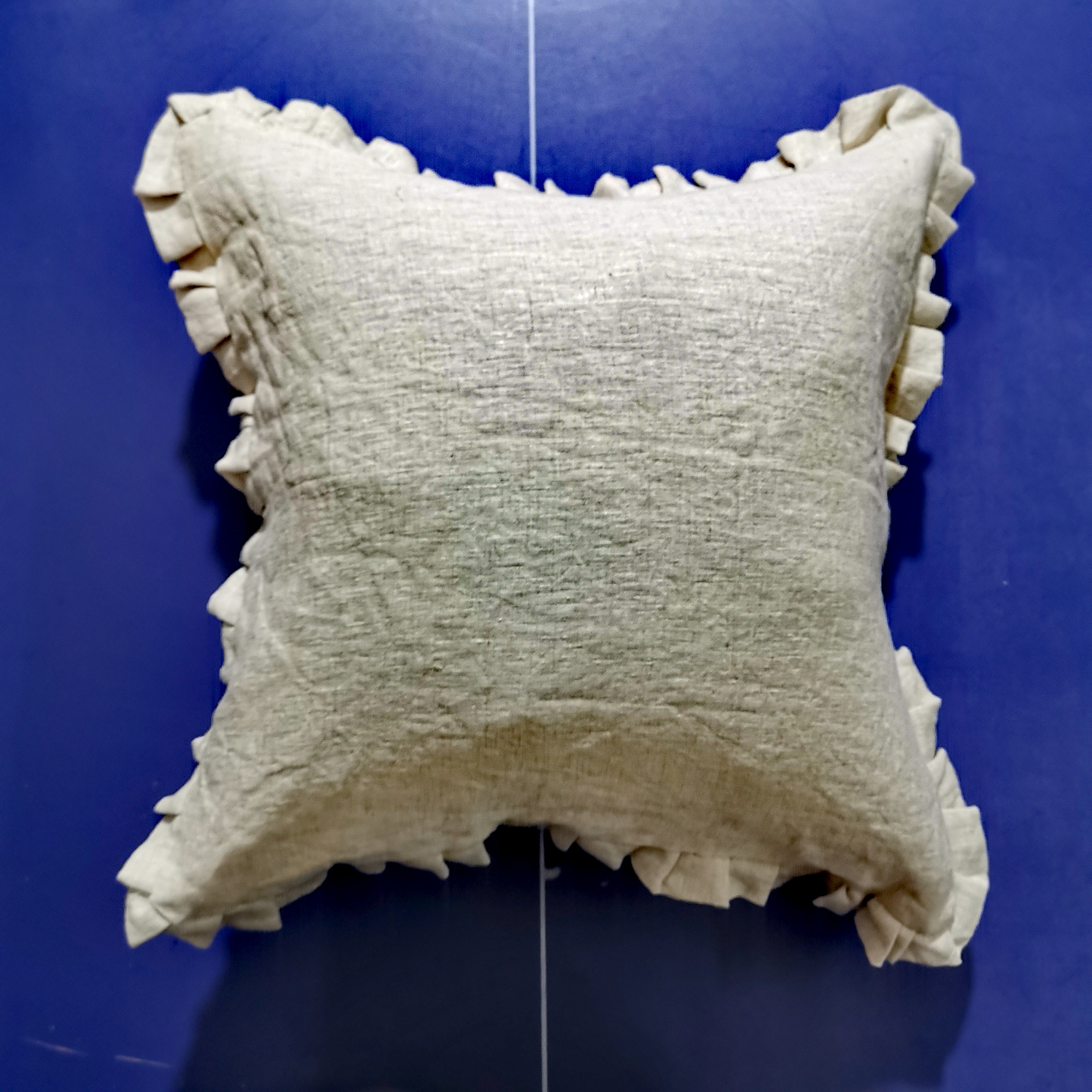 100% linen solid fabric within ruffle cushion