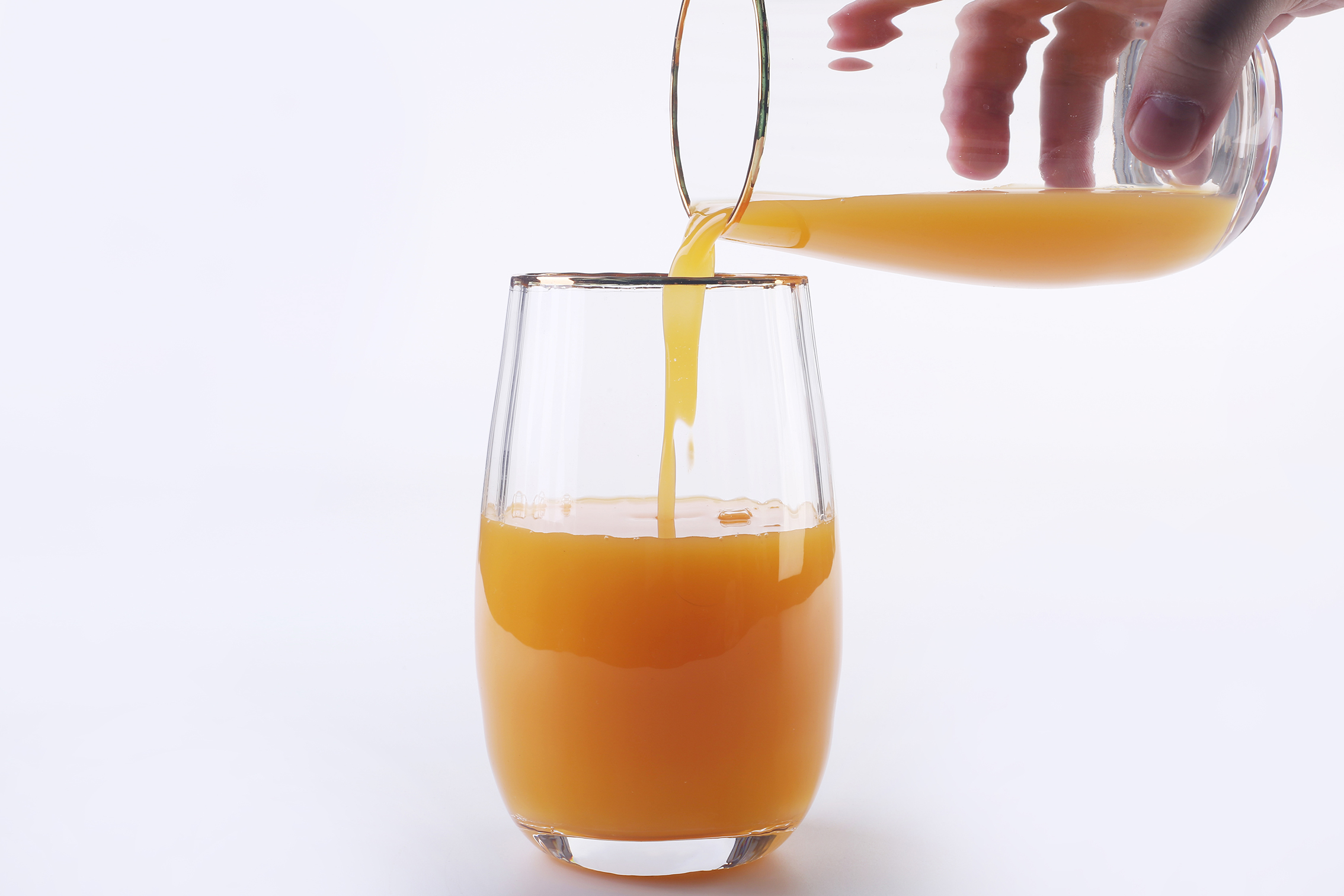 Glass cup with golden rim
