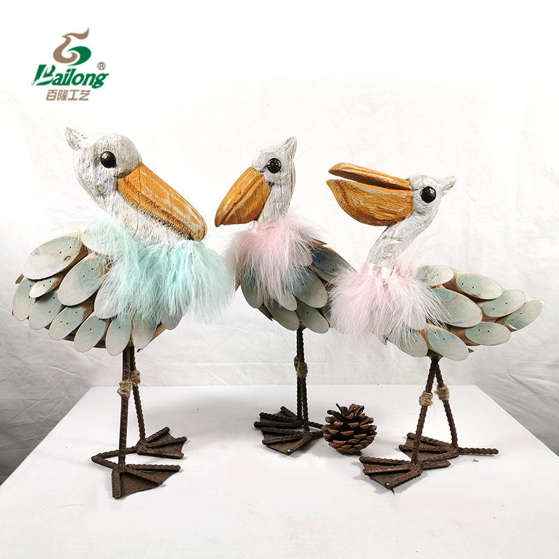 Wooden and iron pelican ornaments