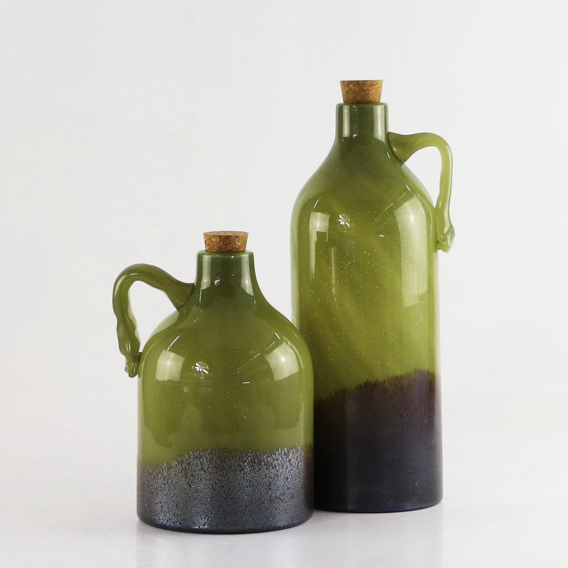 Handmade blown colored glass vase with cork