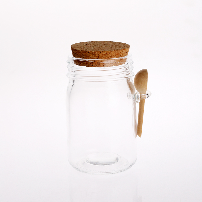 glass canister with cork lid and bamboo spoo