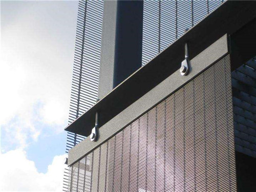 Decorative metal facade screen