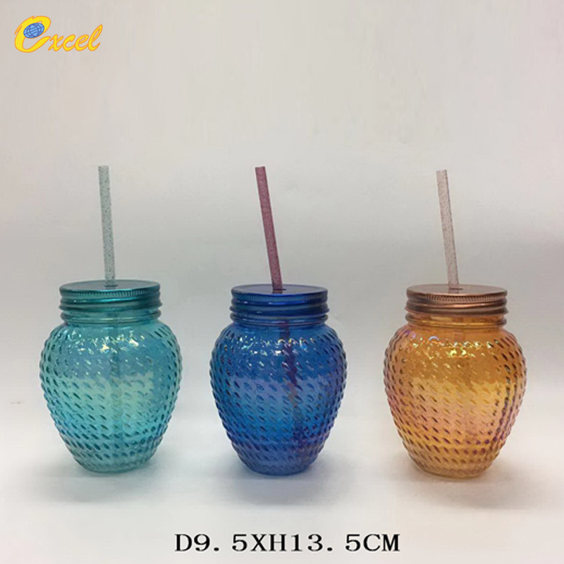 glass mason jar with metal lid and straw