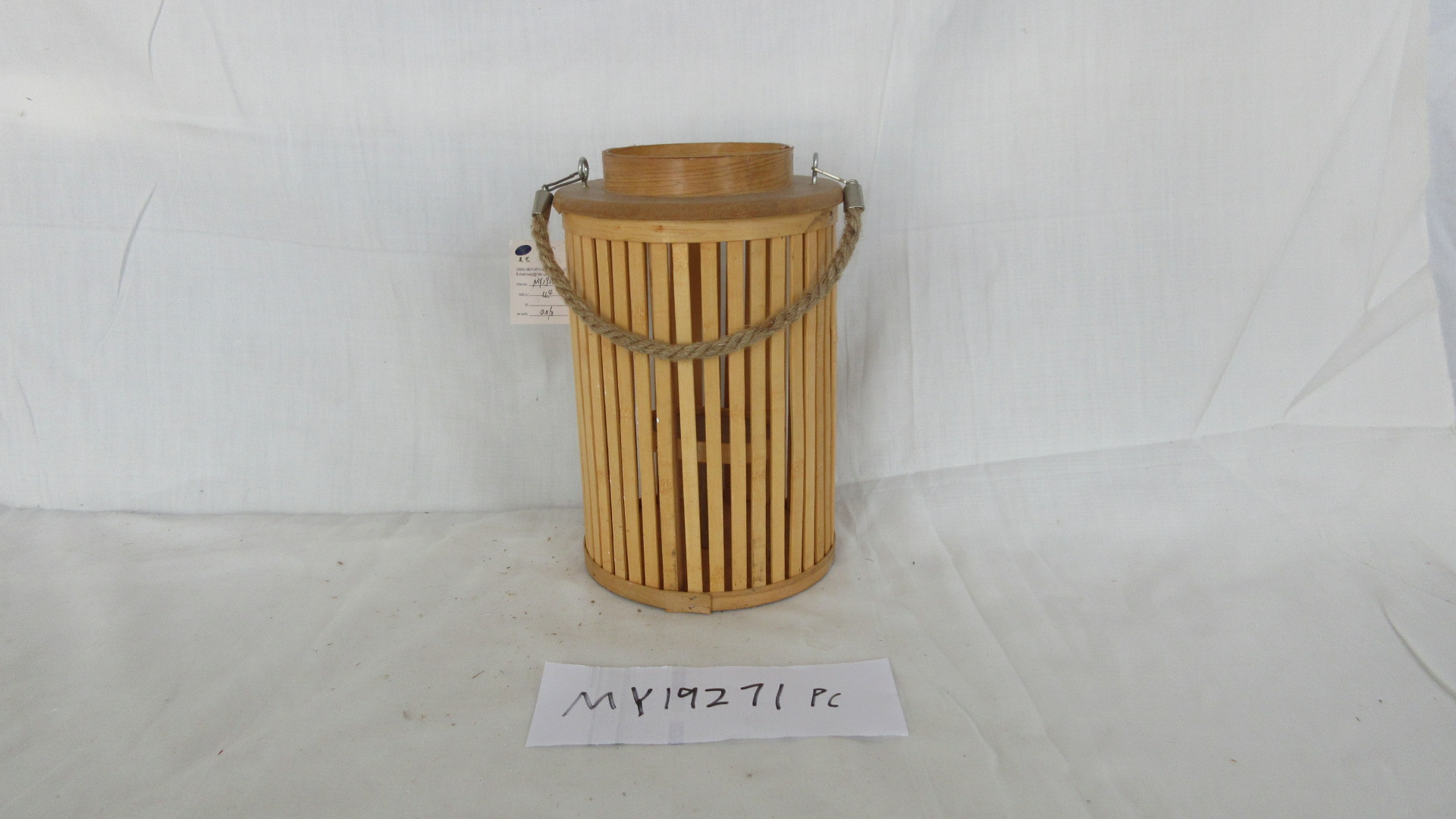 Bamboo lantern candle holder with glass bottle