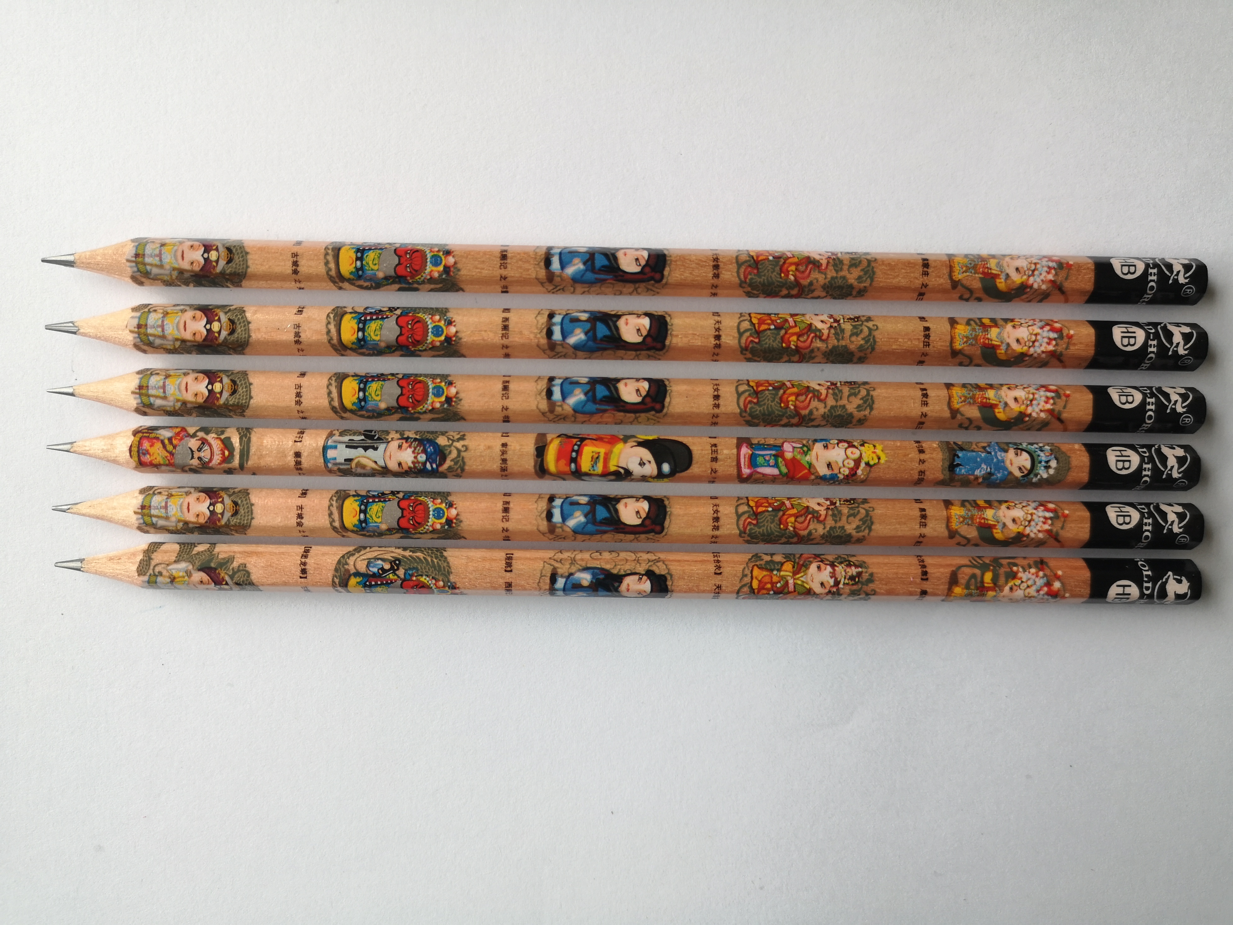 Pencil with transfer film printing