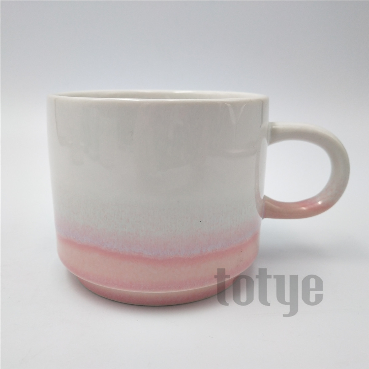 Stoneware mug with reactive glaze