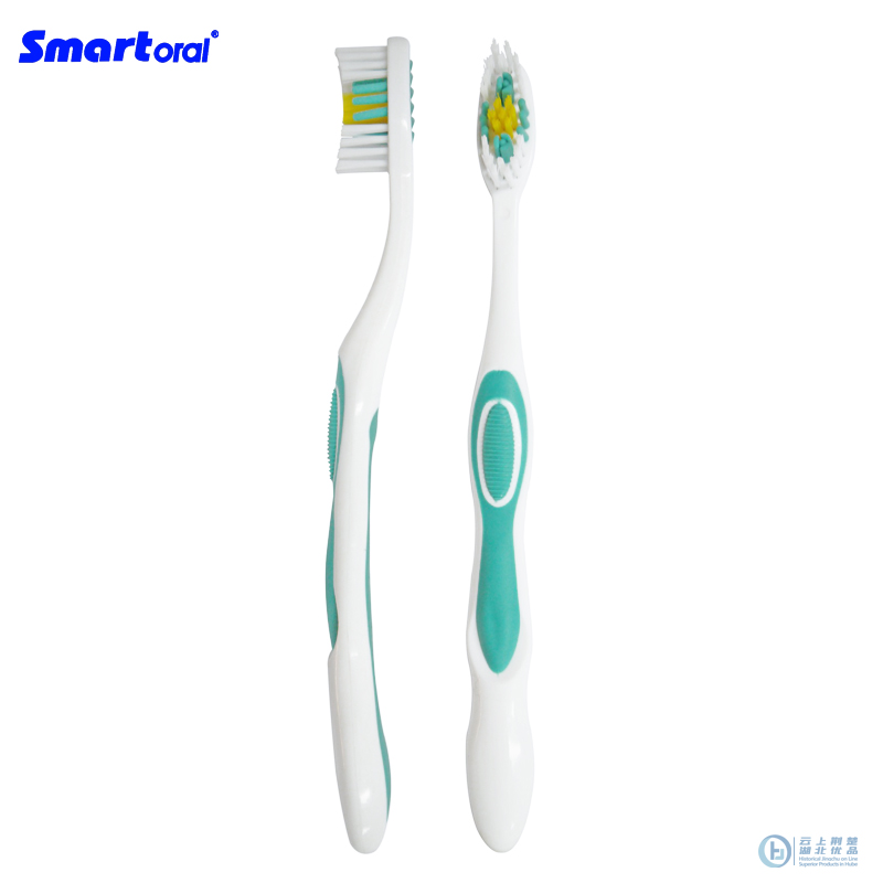 adult toothbrush with tongue cleaner and massage