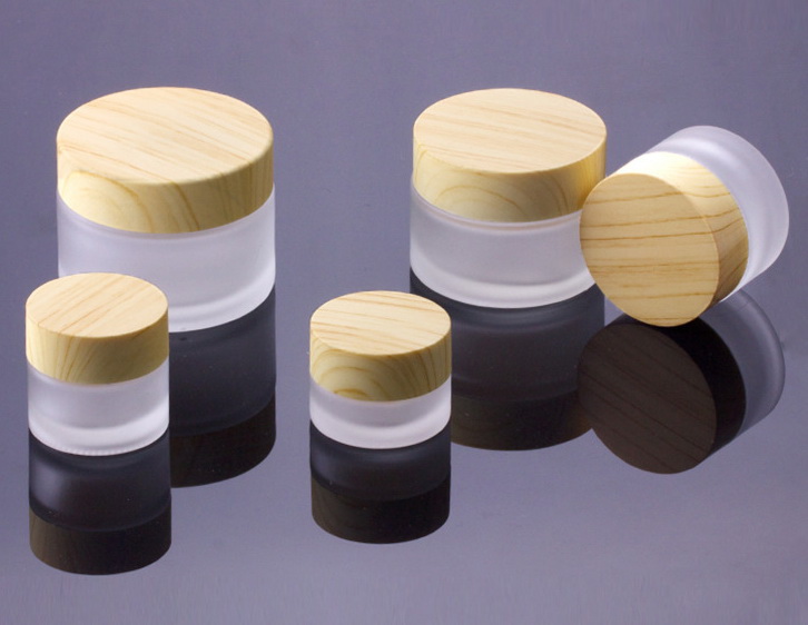 Luxury 30g cosmetic frosted glass cream jar with bamboo wood cap