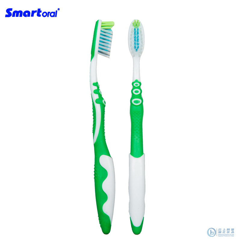 Cross action toothbrush