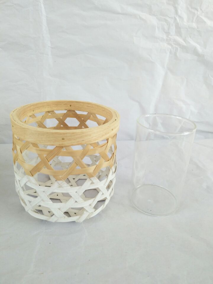 Bamboo baskets are hand-woven into bamboo candlesticks