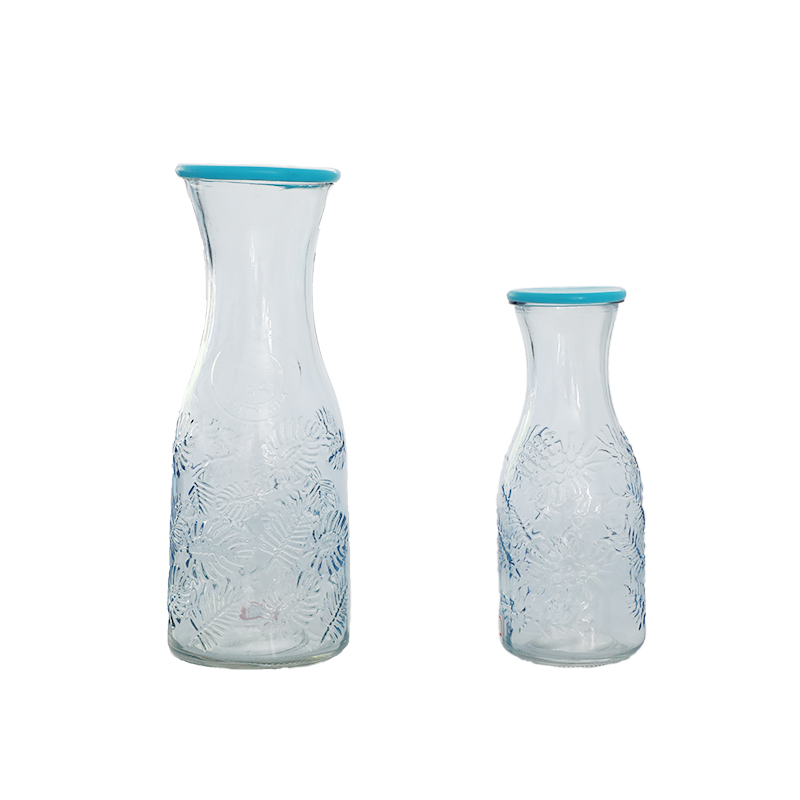 Glass juice bottle
