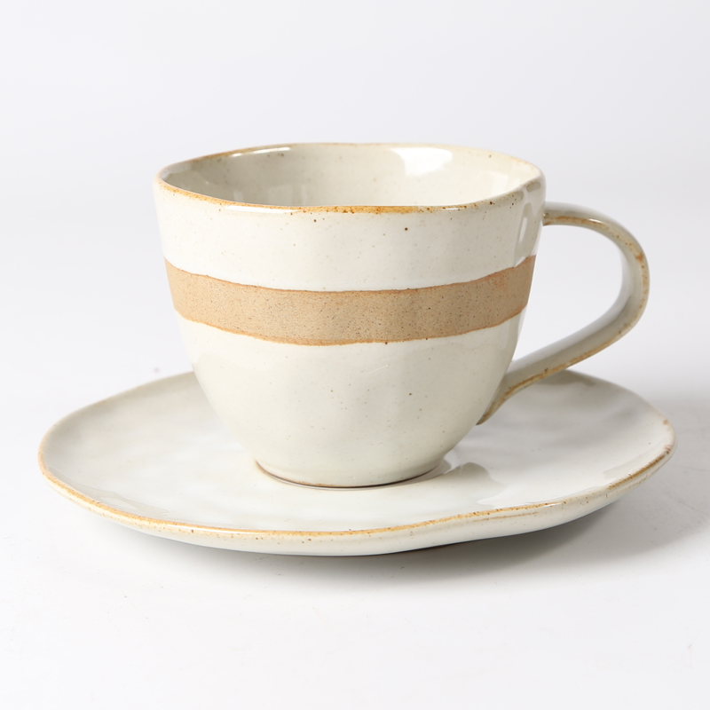 Sandstone irregular tea cup and saucer, wax resist,nature effect